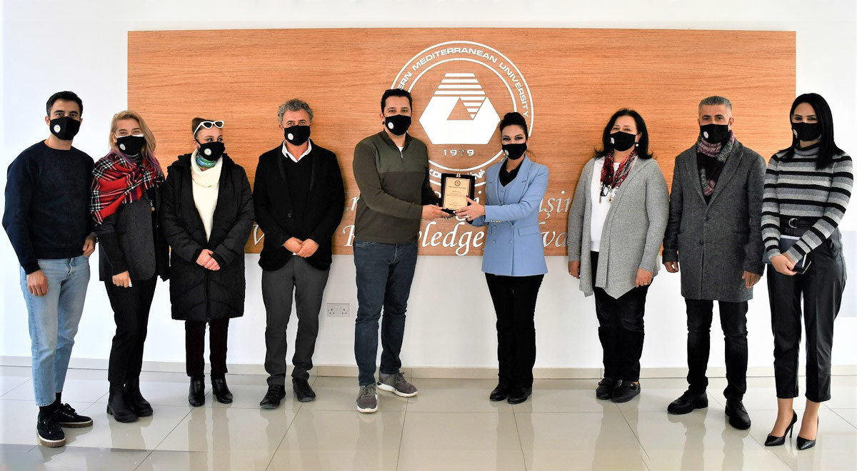 EMU Rector’s Office Presents a Plaque of Appreciation to Famous Producer  Emre Oskay